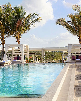 pool with cabanas